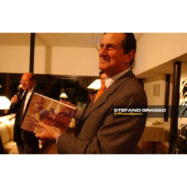 Mr. Luciano Salice with the first copy of the book \'Falbrav - an italian story \' Carimate golf Club 29th april 2004 ph. Stefano Grasso