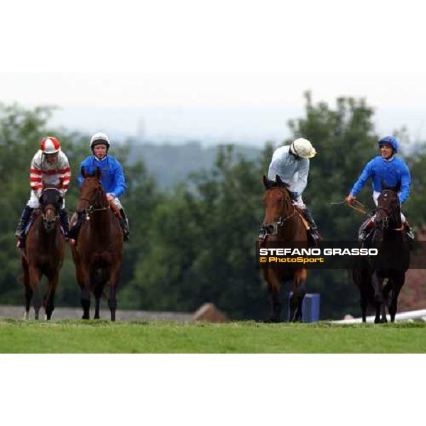 Let The Lion Roar,Rule of Law,North Light and Snow Ridge after the winning post of The Vodafone Derby 2004 Epsom 5th june 2004