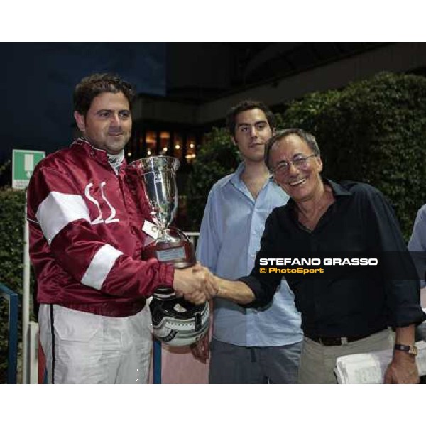 Massimiliano Castaldo receives the congratulations from Roberto Vecchioni after winning the Gran Premio Nazionale Filly- Trofeo Snai - Memorial Eva and Aldo Vecchioni Milan, 2nd july 2009 ph.Stefano Grasso