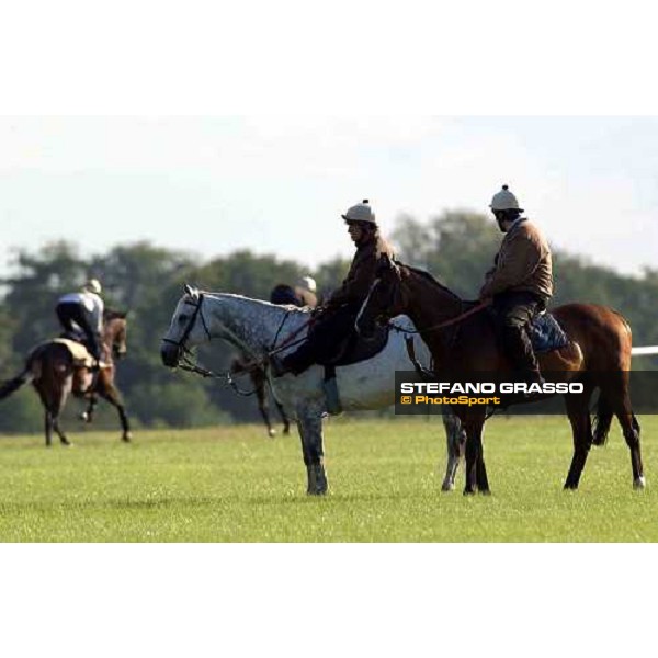 Luca Cumani (on grey horse) at Newmarket Newmarket 8th july 2004 ph. Stefano Grasso