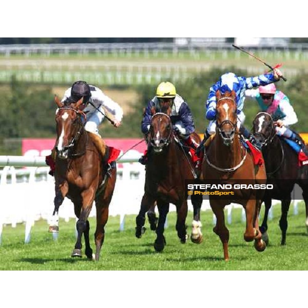 Johnny Murtagh on Soviet Song (left) beats Nayyir. Between the two Le Vie dei Colori with Darryl Holland finish third. The Cantor Odds Sussex Stakes Glorious Goodwood 28 th july 2004 ph. Stefano Grasso