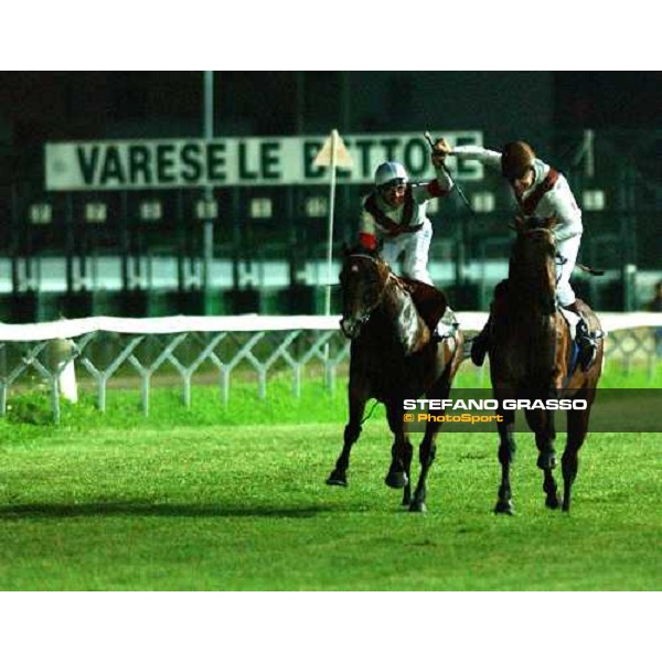 Frankie Dettori and Pinuccio Molteni parading in front of 500o people at Varese racetrack Varese Le Bettole 7th august 2004 ph. Stefano Grasso