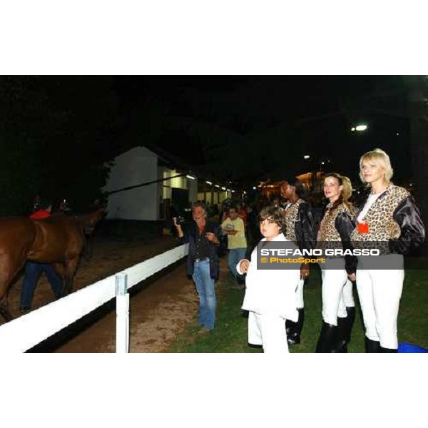 Roberto Cavalli in the parade ring of of Criterium Varesino with son Robert and models Varese Le Bettole 7th august 2004 ph. Stefano Grasso