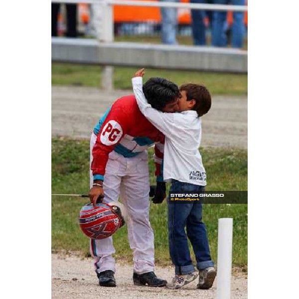 Pippo Gubellini receives the congratulations from his son Edoardo after winning Gran Premio delle Aste Open Milan San Siro racetrack 12th september 2004 ph. Stefano Grasso