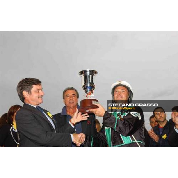 77° Derby Italiano del Trotto Enrico Bellei receives the trophy from on. Mario MAsini Rome, 10th october 2004 ph. Stefano Grasso