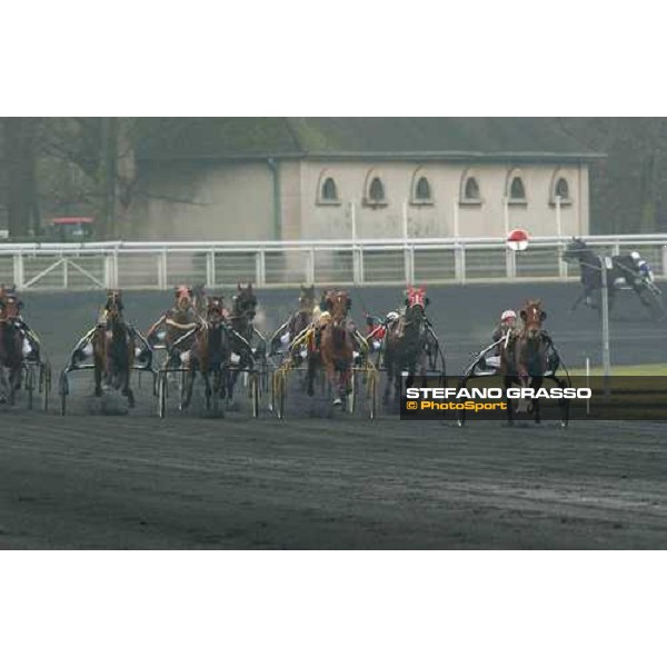 straight of Prix du Luxembourg . 1st from right the winner Kuza Viva leads on Ingen (yellow sulky and Joyau d\'Urbain Paris Vincennes, 29th january 2005 ph. Stefano Grasso