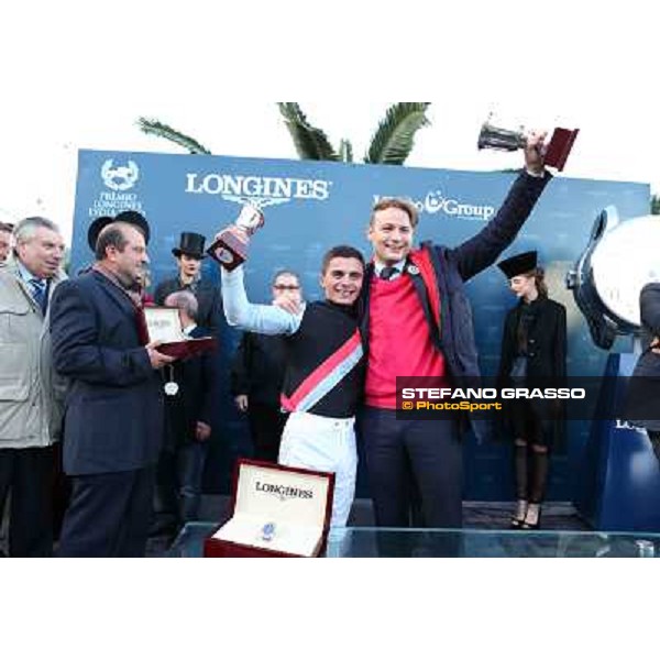 The prize giving of the Gran Premio Longines Lydia Tesio . Andrea Atzeni and Sortileges\'s owner Holger Faust Rome, Capannelle racecourse 28th october 2012 ph.Stefano Grasso