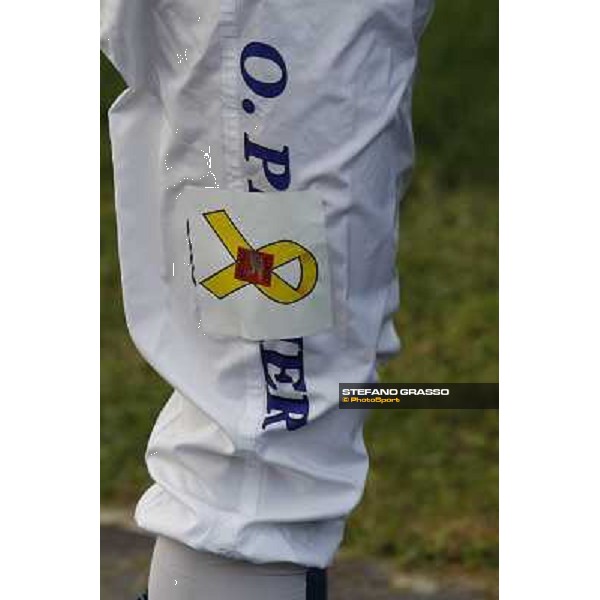 a close up to Olivier Peslier\'s pants with the logo \'Liberi Subito\' for the Italian Marò Roma - Capannelle racecourse,28th oct.2012 ph.Stefano Grasso