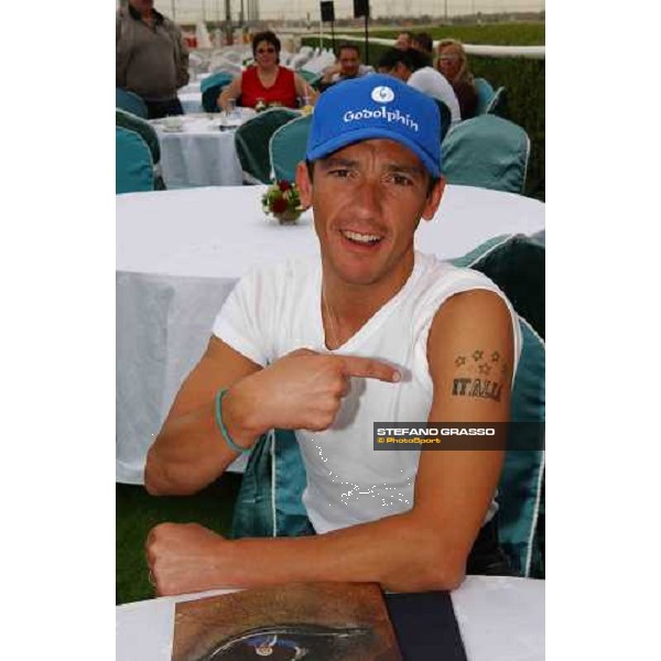 Frankie Dettori showing his new tatoo at Breakfast with the stars Nad El Sheba, race track Dubai 24th march 2005 ph. Stefano Grasso