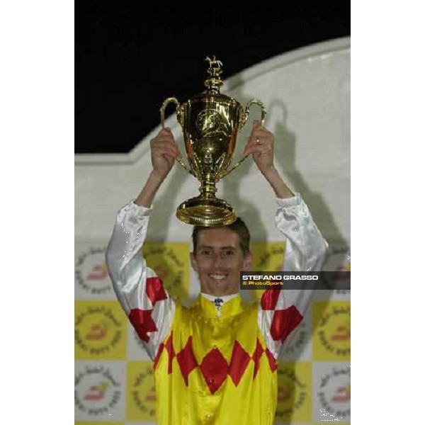 Nash Rawiller stands the trophy of Dubai Duty Free Nad El Sheba- Dubai, 26th march 2005 ph. Stefano Grasso